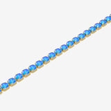 Bracelet with blue gemstones on a white background