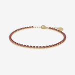 Garnet birthstone tennis bracelet in gold