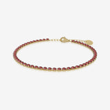 Garnet birthstone tennis bracelet in gold