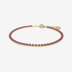 Ruby birthstone tennis bracelet in gold