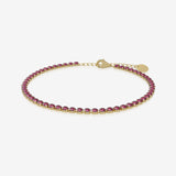 Ruby birthstone tennis bracelet in gold