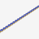 Bracelet with blue gemstones on a white background