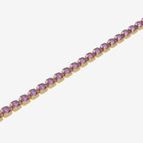 Bracelet with pink gemstones on a white background