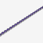 Bracelet with purple gemstones on a white background