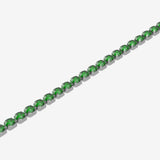 Green tennis gemstone bracelet in silver on a white background