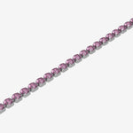Bracelet with pink gemstones on a white background