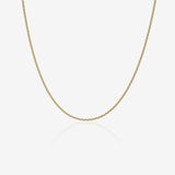 Gold chain necklace on a white background