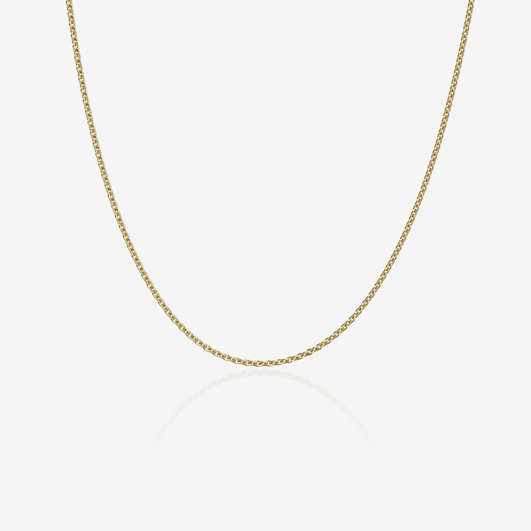 Gold chain necklace on a white background