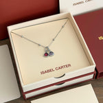 Necklace with double birthstone pendants in an Isabel Carter box