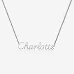 Silver necklace with 'Charlotte' pendant on a light gray background