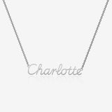 Silver necklace with 'Charlotte' pendant on a light gray background