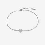 Silver bracelet with heart-shaped tag with engraving on a white background