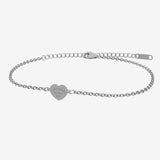Silver bracelet with a heart-shaped tag with engraving on a white background