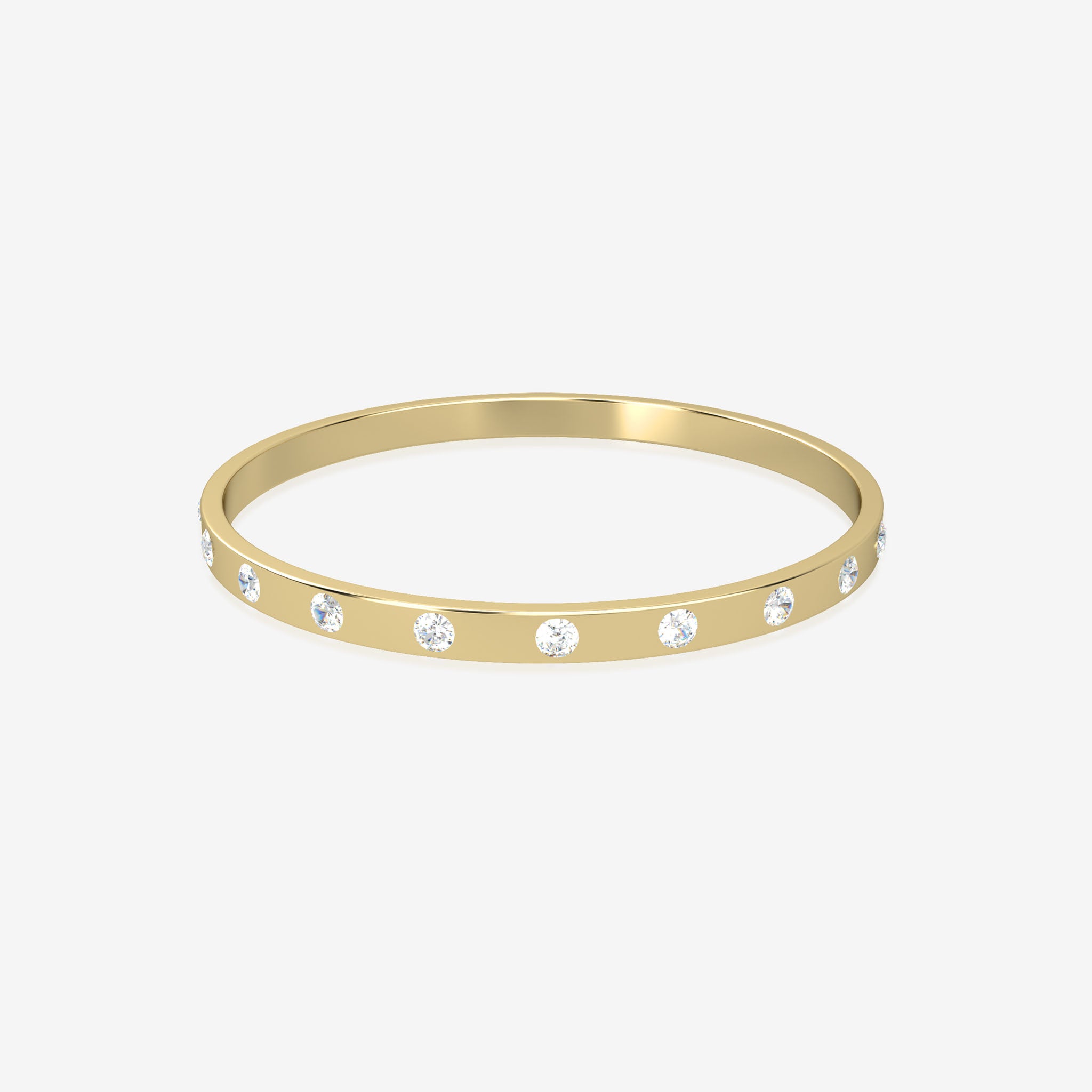Gold bangle with embedded crystals on a white background