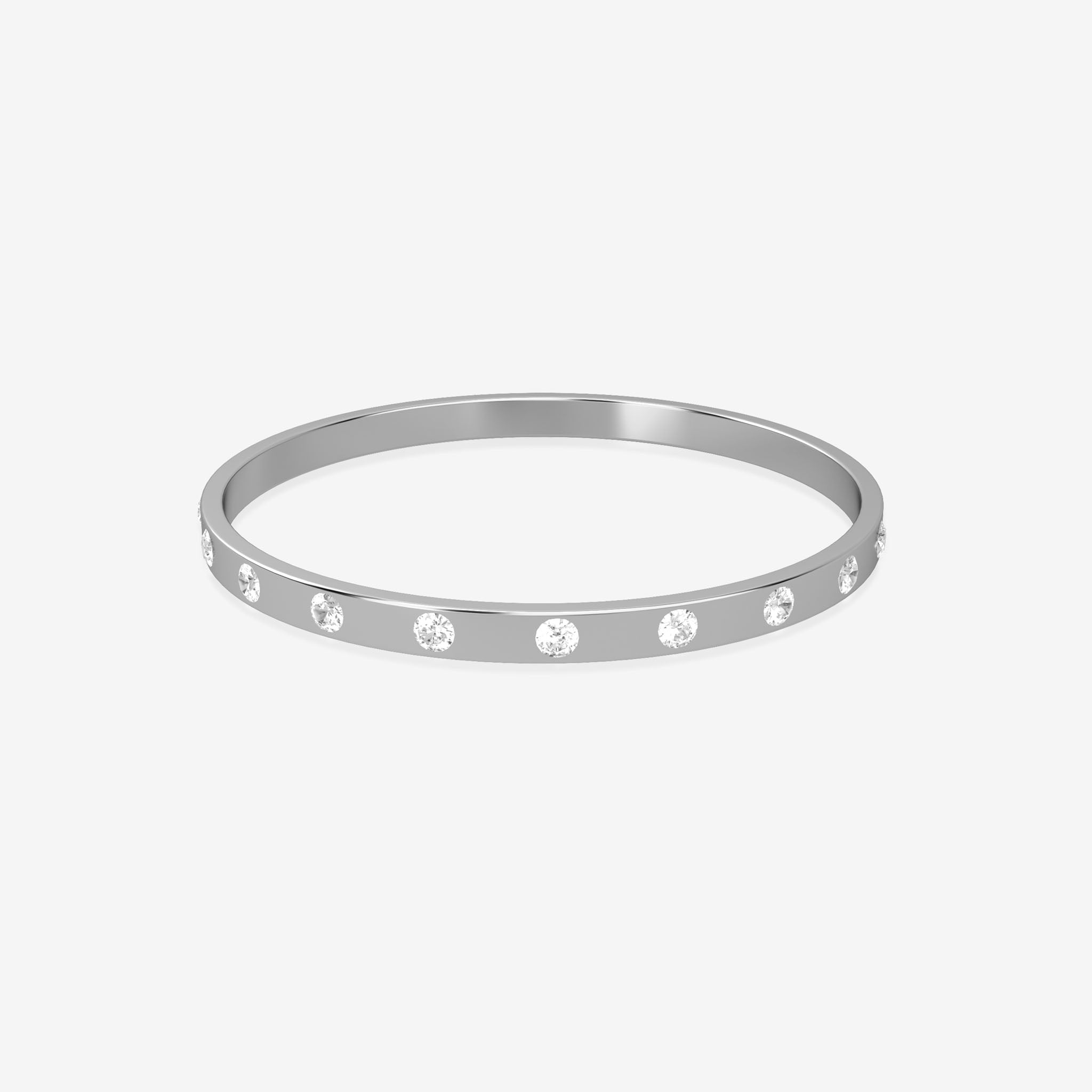 Silver bangle with embedded stones on a white background