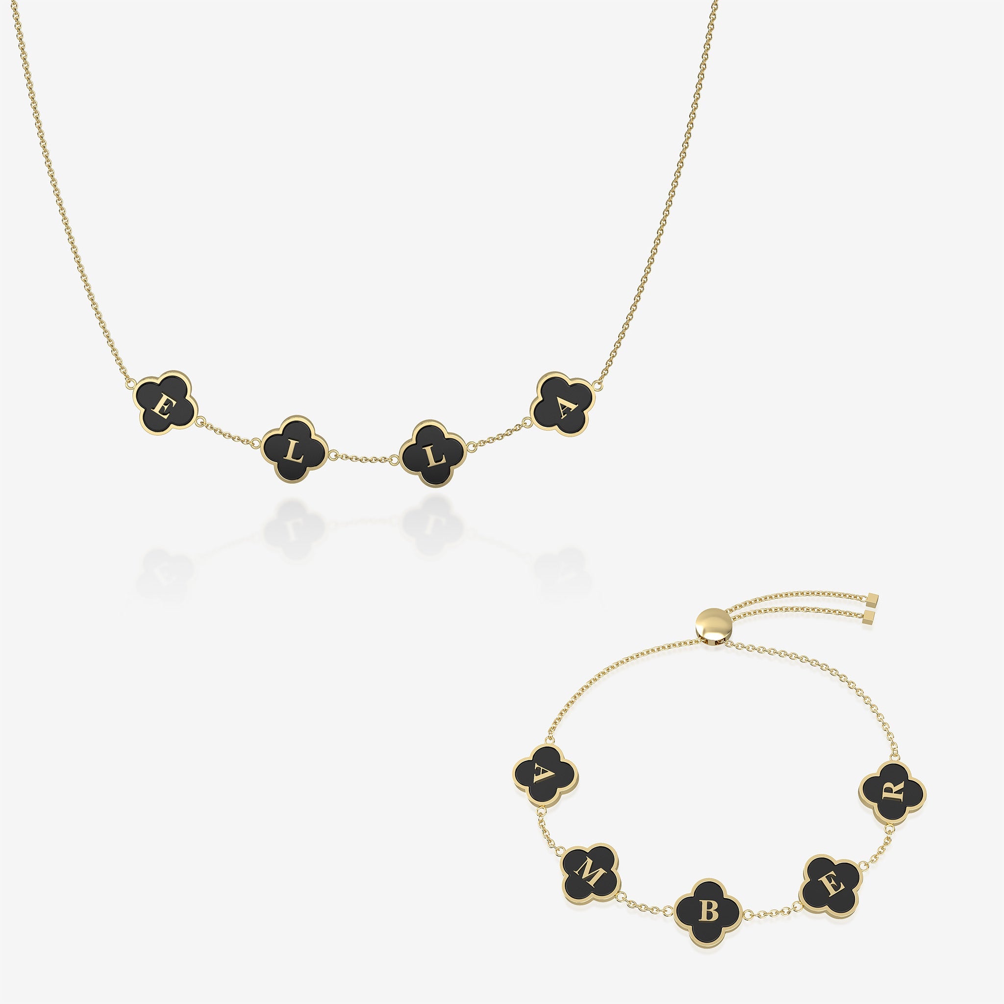 Gold and black clover name necklace and bracelet set on white background