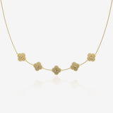 Gold clover necklace with name engraved on a white background