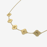 gold clover necklace with name engraved on white background