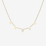 Gold necklace with 'AMBER' initial spread across the chain on a white background