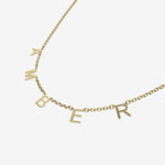 Gold necklace with 'AMBER' initials spread acorss the chain on a white background