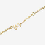 Gold bracelet with 'Mama' on a white background