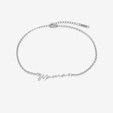 Silver bracelet with 'Mama' engraving on a white background