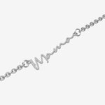 Silver bracelet with 'Mama' engraved on a white background