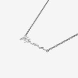 Silver necklace with 'Mama' inscription on a white background