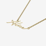 Gold name necklace with 'Alice' inscription on a white background