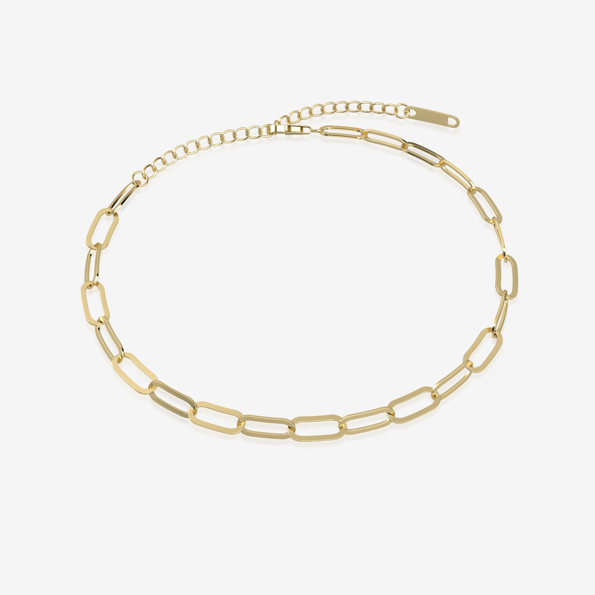 Gold paperclip bracelet on a white background