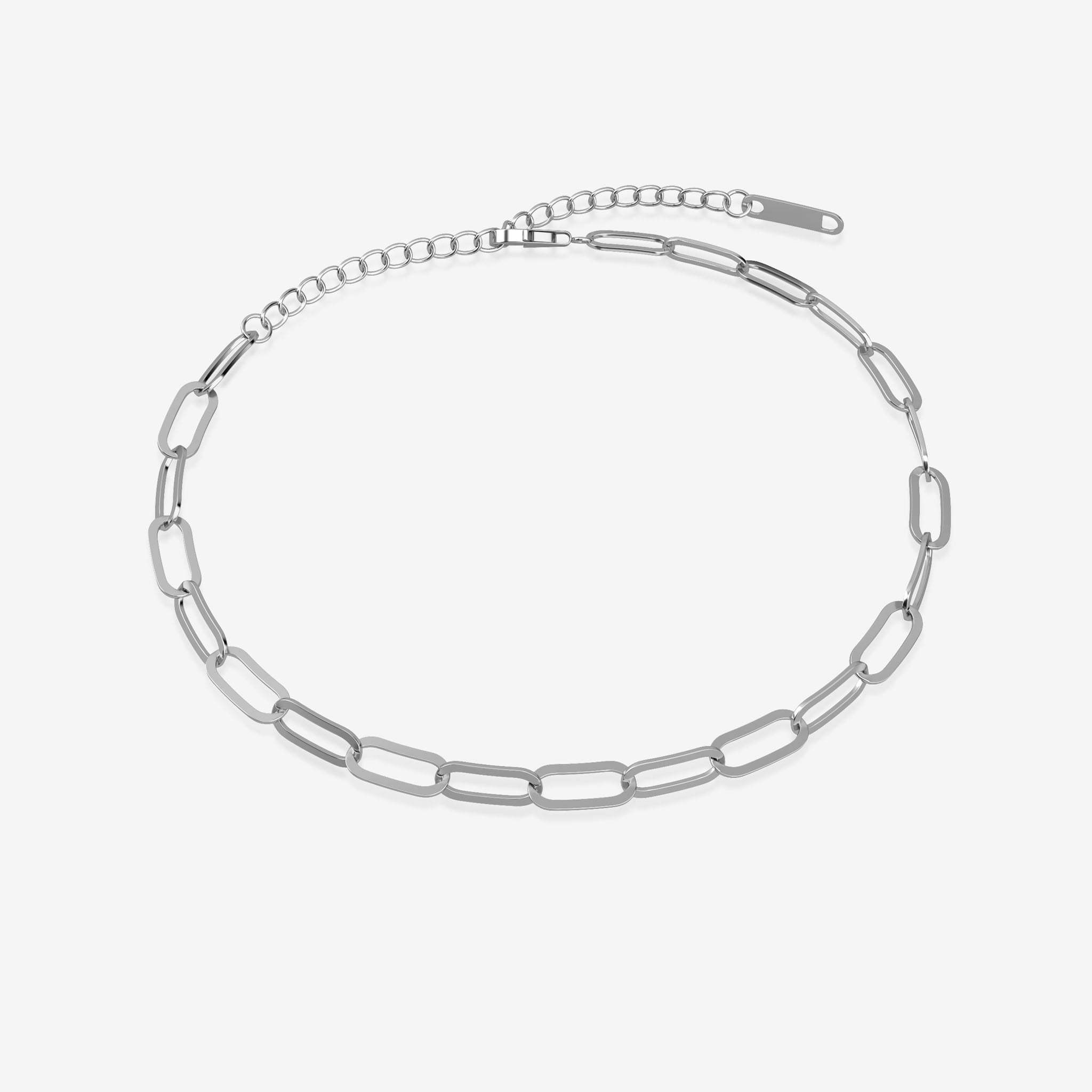 silver paperclip bracelet on white background