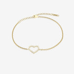 Gold bracelet with a heart-shaped clasp on a white background