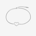 Silver bracelet with a heart-shaped clasp on a light gray background