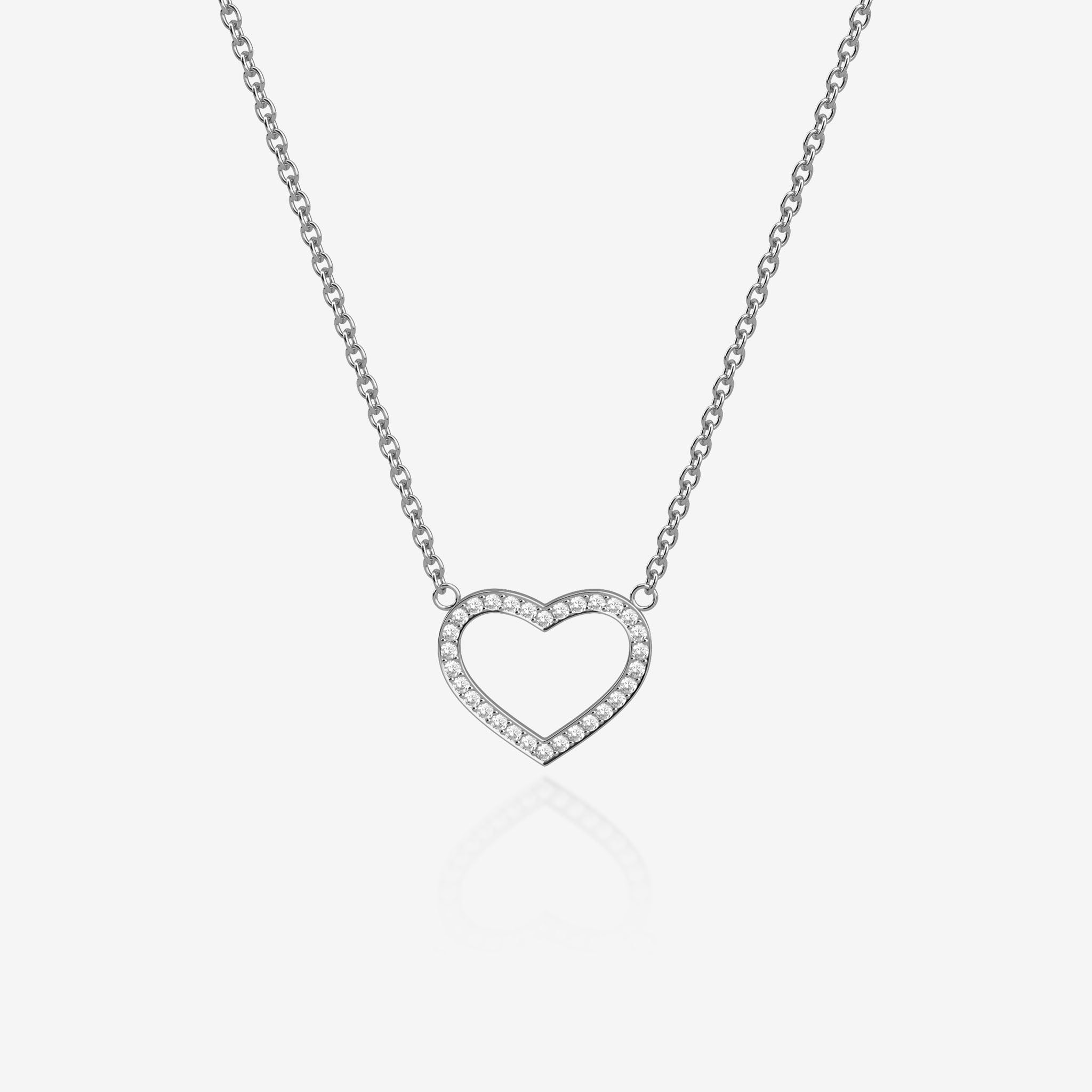 Heart-shaped necklace with small diamonds on a white background