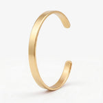 Signature C-cuff gold 18k steel bangle