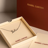 Personalised jewellery signature name necklace in silver with Isabel Carter packaging