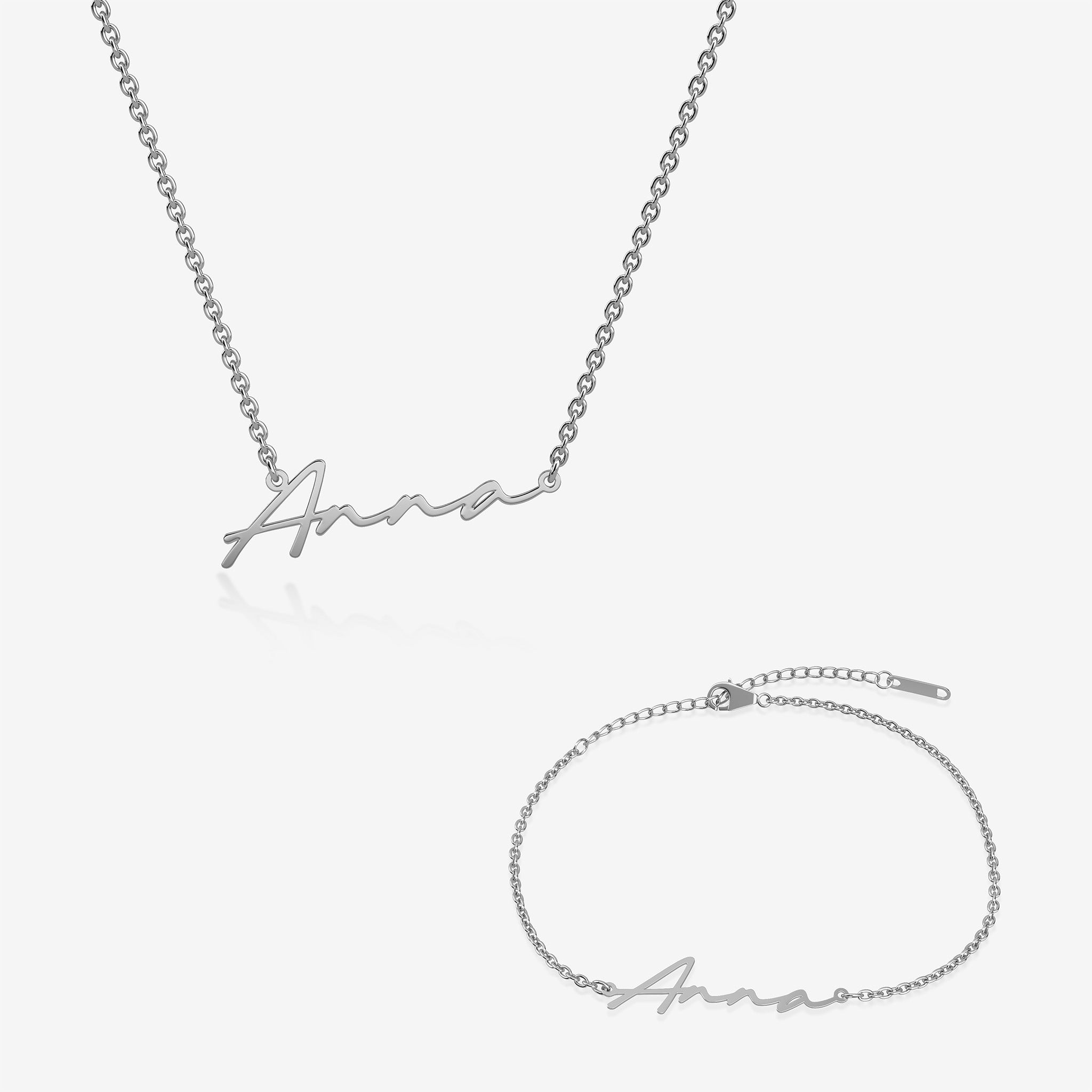 Silver name necklace and bracelet set with 'Anna' engraving on a white background
