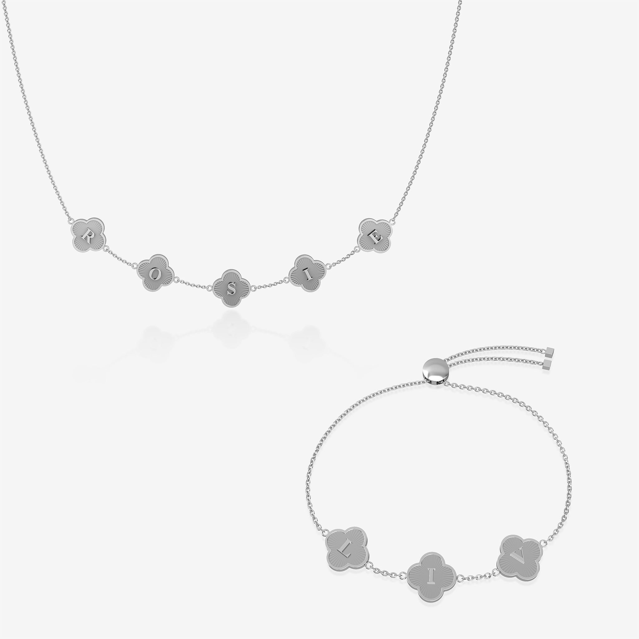 Silver clover name necklace and bracelet set on white background
