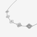 silver clover necklace with name engraved on white background