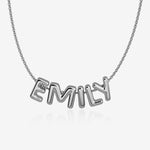 Silver necklace with 'EMILY' bubble letters on a white background