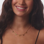 personalised womens jewellery in gold on model 