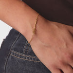 personalised womens jewellery in gold on model 