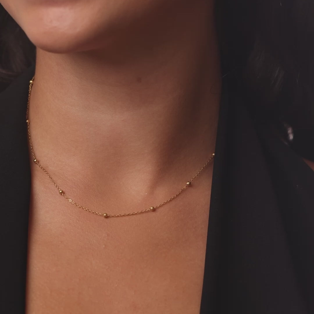 personalised womens jewellery in gold on model 