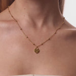 personalised womens jewellery in gold on model 