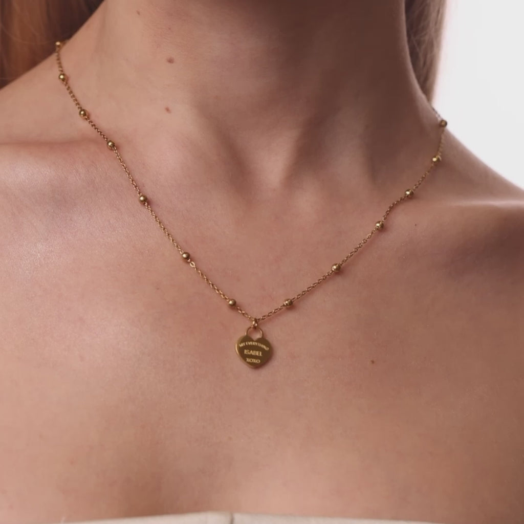 personalised womens jewellery in gold on model 