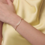 personalised womens jewellery in gold on model 