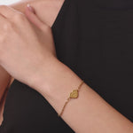 personalised womens jewellery in gold on model 